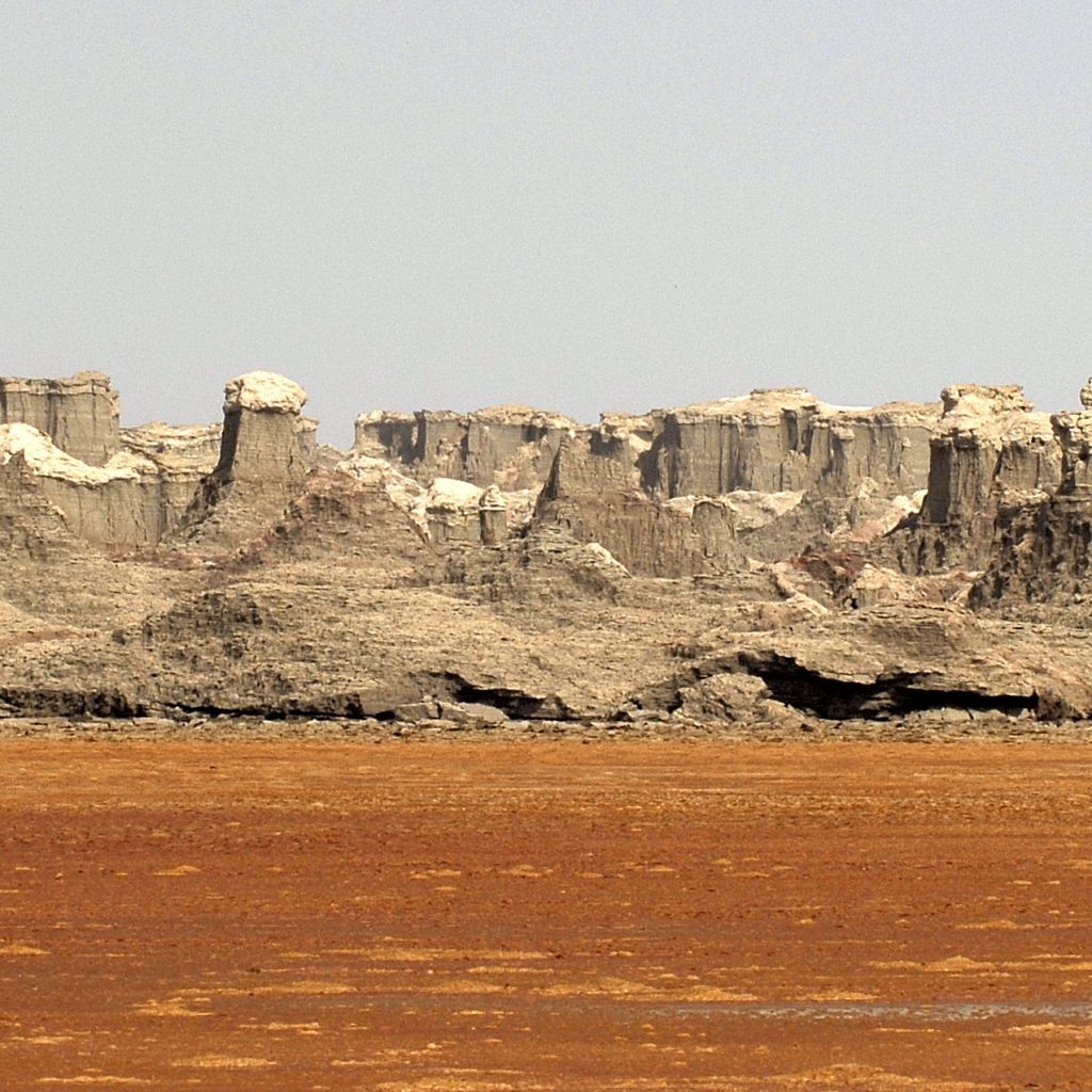 Danakil Depression Tour Ethiopia Erta Ale Volcano Danakil Depression Tour Dallol sulfur springs Ethiopia Afar salt flats Danakil Depression Tour Camel caravan in Danakil Depression Ethiopia